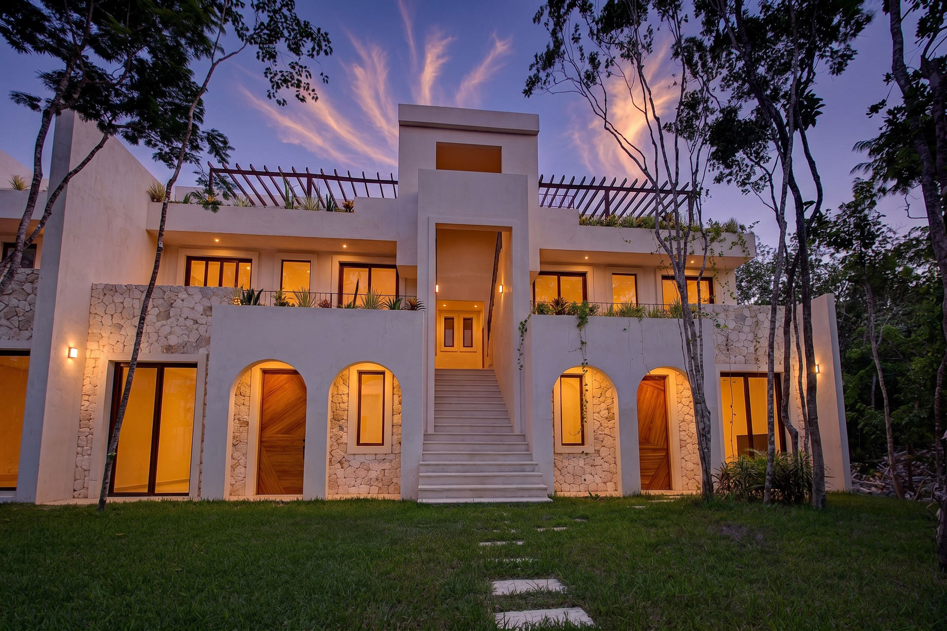 Modern townhouse facade at StellarResidences, Tulum Gardens gated community